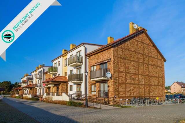 Апартаменты Apartamenty NCNK Mierzeja Park Sztutowo Штутово-9